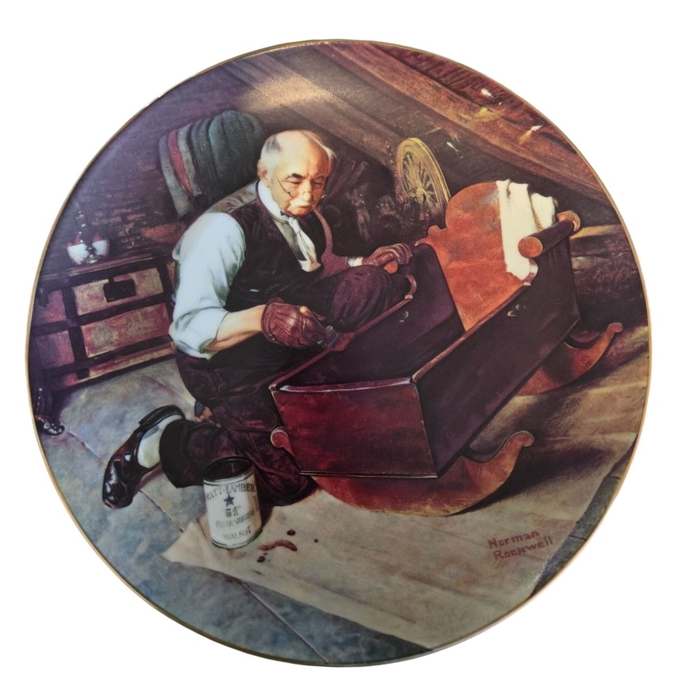 A collector numbered plate titled "Grandpa's Gift" by Norman Rockwell.
